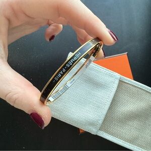 Hermes Black and Uni Gold and Black Bangle